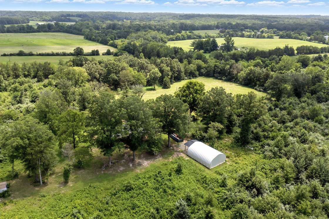 Aerial view of rolling wooded pasture on a farm near Elkwood, Culpeper County, Virginia